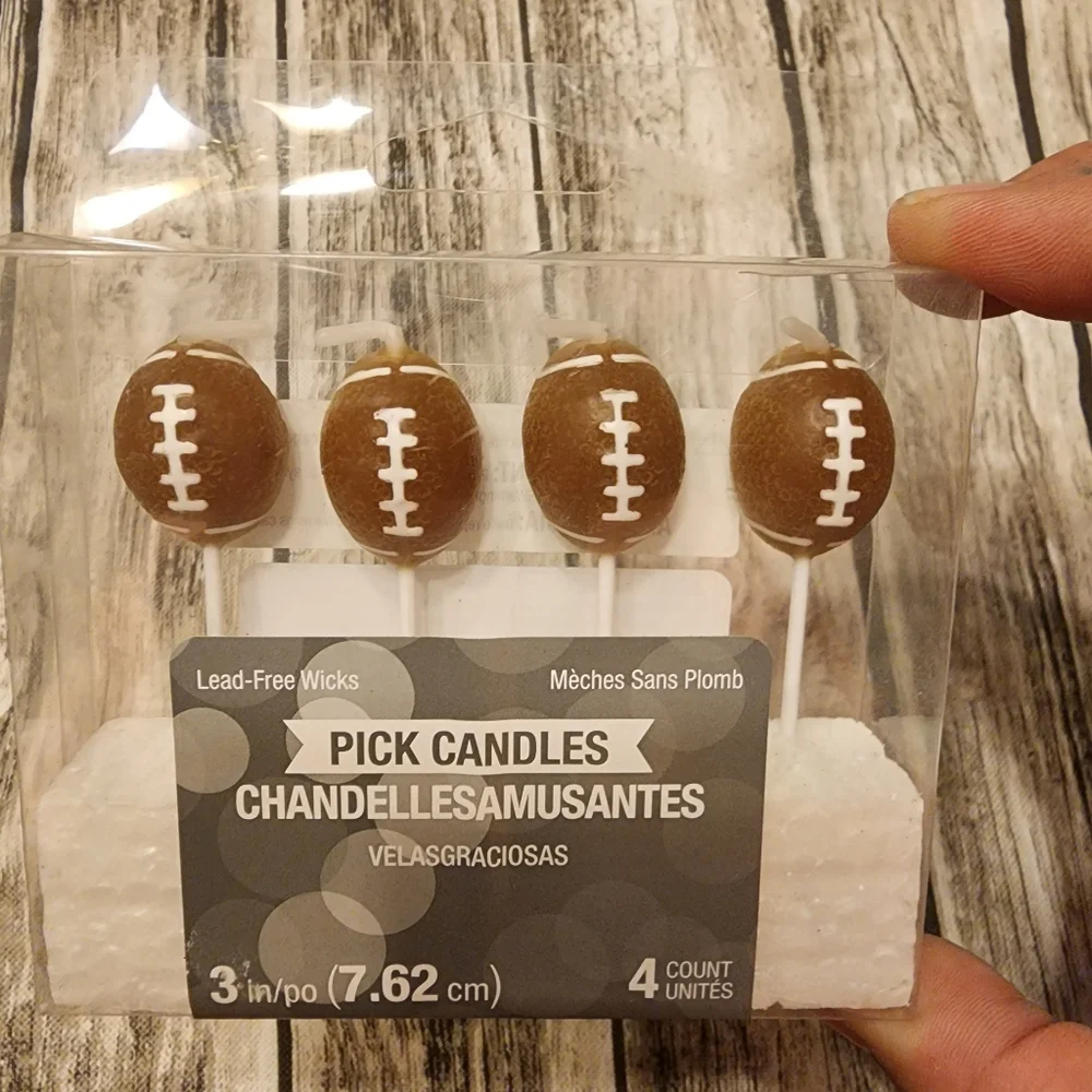 Football birthday party candles, set of 4, 3 inches each.